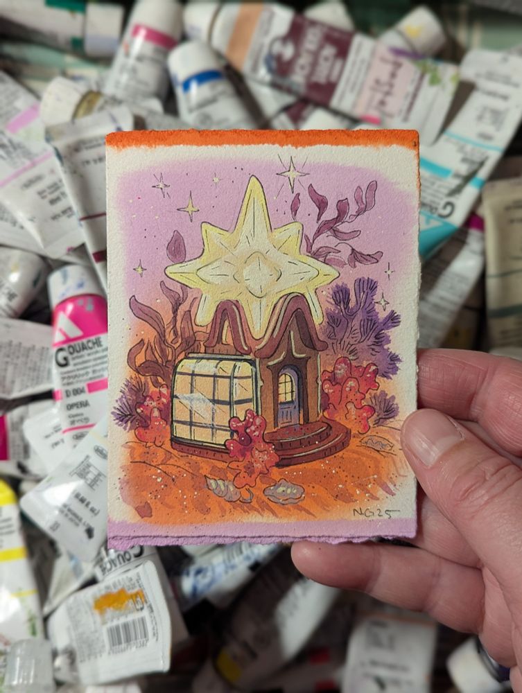 Artist holding painting made from gouache, ink on thick watercolor paper. 