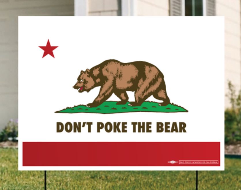 Vamp on the California state flag saying “Don’t Poke the Bear” under the bear 