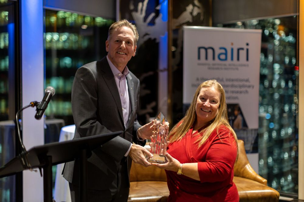Ontario Tech Chancellor, Mitch Frazer, presenting the Chancellor’s Circle Award to  Halloway Developments Ltd. President and Valiant Rental Properties Vice-President, Beth Kelly, during the Chancellor's Dinner event in Toronto, Ontario.
