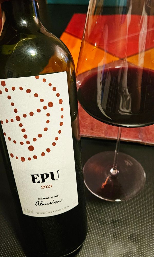 Viña Almaviva Epu 2021, Chile 

Inky in color with a short reddish rim.

Full-bodied and bold with medium acidity.

Dry on the palate with nice complexity.

Showing black plums, cooked cherries, cedar, black currants, tobacco leaf, earth, light vegetables, cola, pencil lead, peppercorn and herbs.

Long finish with soft tannins and cherries. 

This is a delicious Cabernet Sauvignon based Bordeaux blend from Chile. Rich and extracted. Showing nice balance and mouthfeel. 

Needs an hour to open up properly, and will continue to age nicely in the next 5 to 7 years. 

Wine Advocate 94 points. Wine Spectator 92 points. 

Fruit forward and a good sipping wine. Will also pair nicely with a big piece of steak.

A blend of 80% Cabernet Sauvignon, 15% Carmenere and 5% Merlot. Aged in (10% new) French Oak barrels for 12 months. 

15% alcohol by volume.

92 points.

$75.