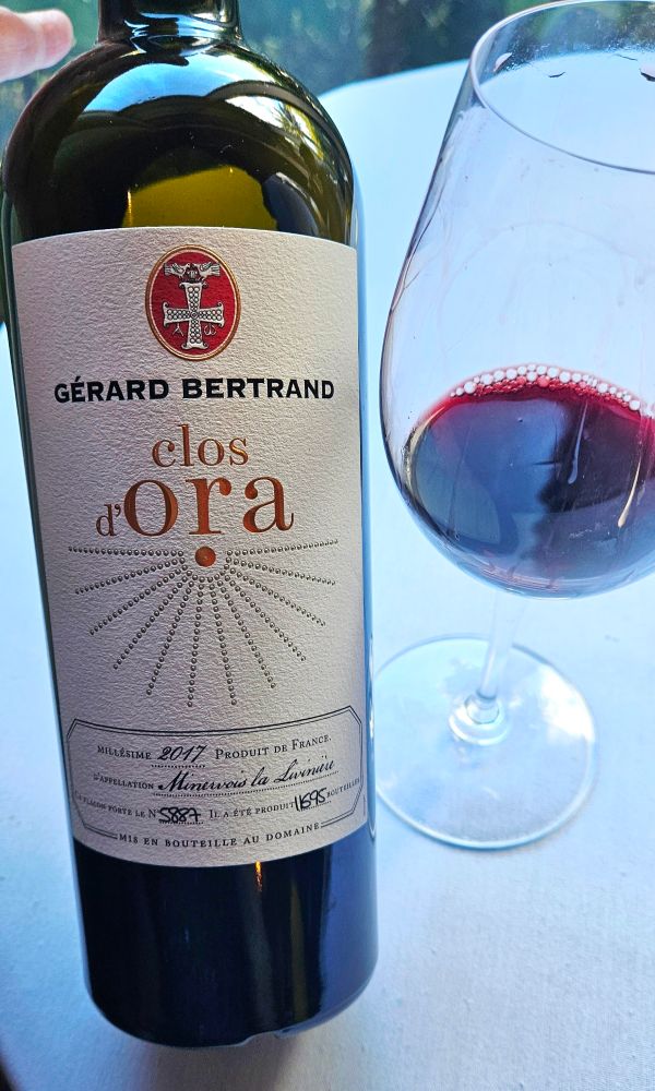 Gerard Bertrand Clos d'Ora Minervois La Livinière 2017, France 

Deep purple in color with a short reddish rim. 

Fruity nose and full bodied, with medium acidity. 

Dry on the palate and complex. 

Showing blackberries, black currants, plums, cooked cherries, cedar, light cola, vanilla, licorice, chocolates, tobacco, herbs, spices and light earth. 

Long finish with fine grained tannins and tangy raspberries. 

This is a gorgeous 8 year old Rhone blend from Languedoc-Roussillon in France. Elegant and robust. Rich and extracted. 

Good right out of the bottle and better with airtime. Smooth and nicely balanced. 

Robert Parker 93 points. 

Drinking beautifully now, and will continue to age nicely in the next 10 years.  Spicy, interesting and entertaining. 

Good by itself as a sipping wine or with food. Paired wonderfully with my grilled Lamb chops. 

A blend of Grenache, Syrah, Mourvedre and Carignan. A small production of less than 12,000 bottles. Biodynamic. 

15.5% alcohol by volume. 

94 points. 

$250.

