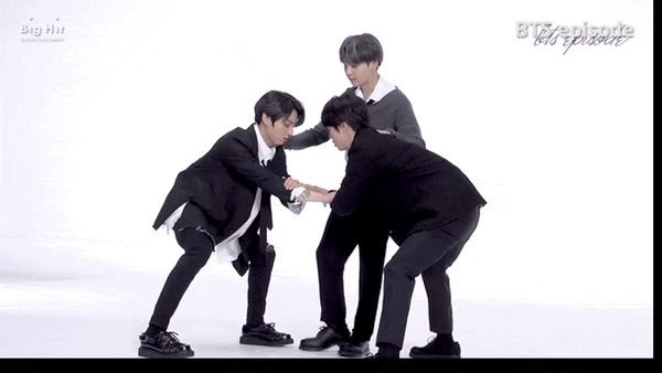 JK and Jin making a seat with their arms for Yoongi to sit on