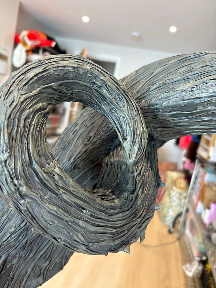 I close up shot of paintwork on a foam horn/antler