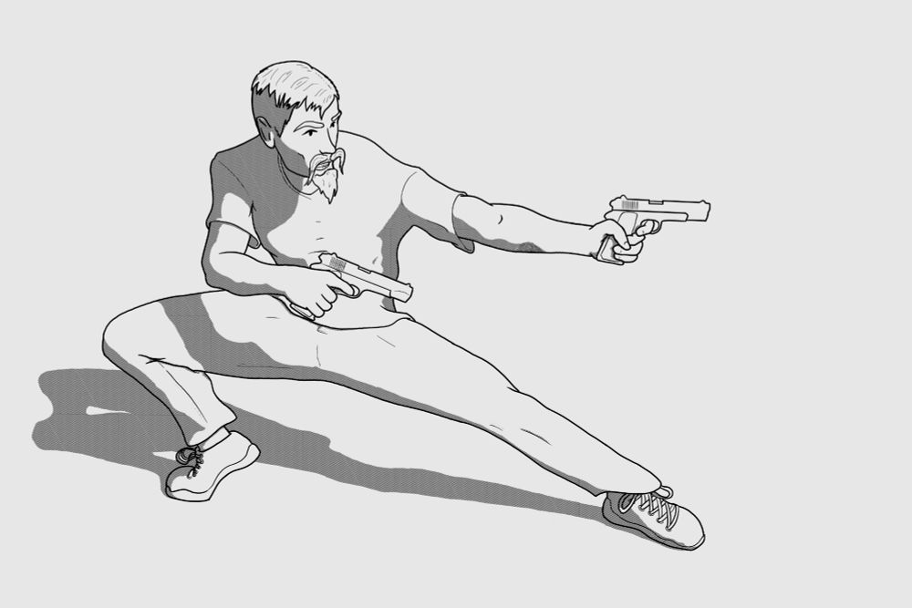 A man in a crouched position, pointing two handguns off-screen