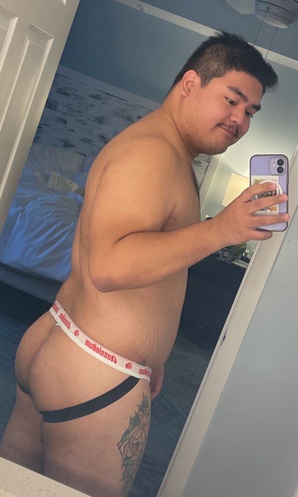 A butt pic wearing the same jockstrap but now with no other clothes 