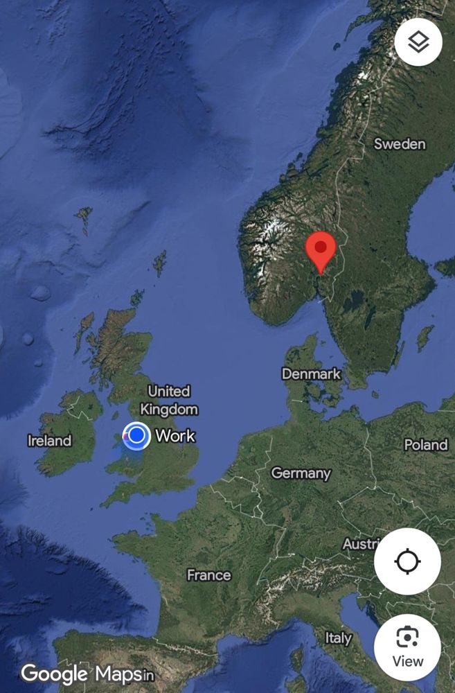 Screenshot of a map with a dropped red pin near Oslo in Norway and a blue circle close to Liverpool, UK. 