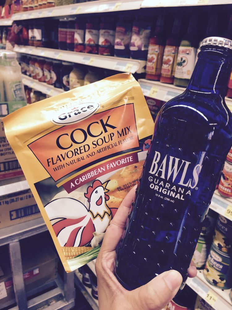 A picture of Suleikha’s hand awkwardly and hilariously holding a packet of Grace brand Cock flavored soup mix alongside a bottle of Bawls soda.  The Bawls bottle is blue glass with odd bumps all over it. Ribbed for her pleasure? You decide. 