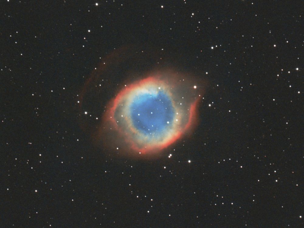 Helix Nebula imaged with a Canon EOS 700d on a 130mm Newton telescope. I used an Astronomik UHC filter for better contrast due to low elevation from the horizon. The image is composed from roughly 160 two minute exposures, stacked to create an image with about 5h30min total integration time.