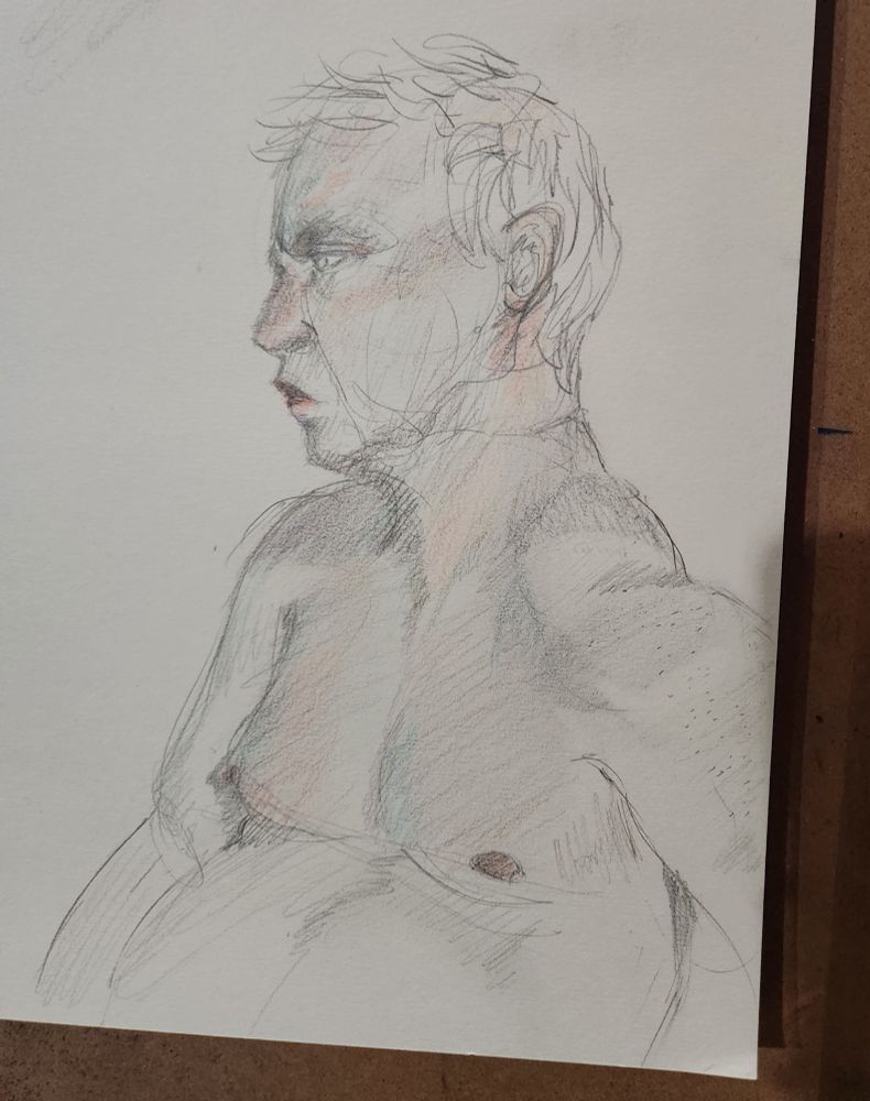 waist up sketch of a masc model sitting down
blue colors added in colored pencil for the bounce light 
warmer shades added to match skin color fluctuations 