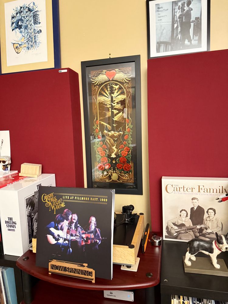 The album cover for Crosby, Stills, Nash, and Young Live at the Fillmore East in 1969. As well as a Boston Terrier dog statue to remind me of all the much loved Boston Terriers that have spent time here. 