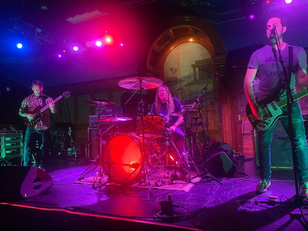 The three members of the band Terry Gross playing live.