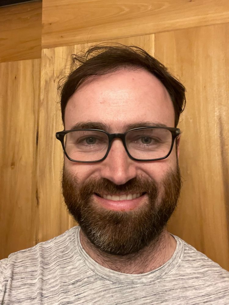 A photo of a man who has a striking resemblance to the “human form of ChatGPT”