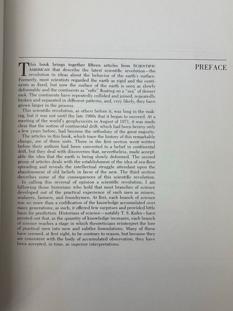Scientific American font. A book page that describes the revolution of plate tectonics as it happened from 1952 to 1972. 