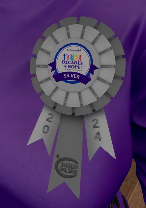 A silver award ribbon pinned on a purple shirt. A Silver circle with a blue stroke and purple ribbon at the base reads: Fundraising Club. (logo with an image of 6 dancers in various colors.) Decades of Hope. 2024 Relay For Life of Second Life. Silver.