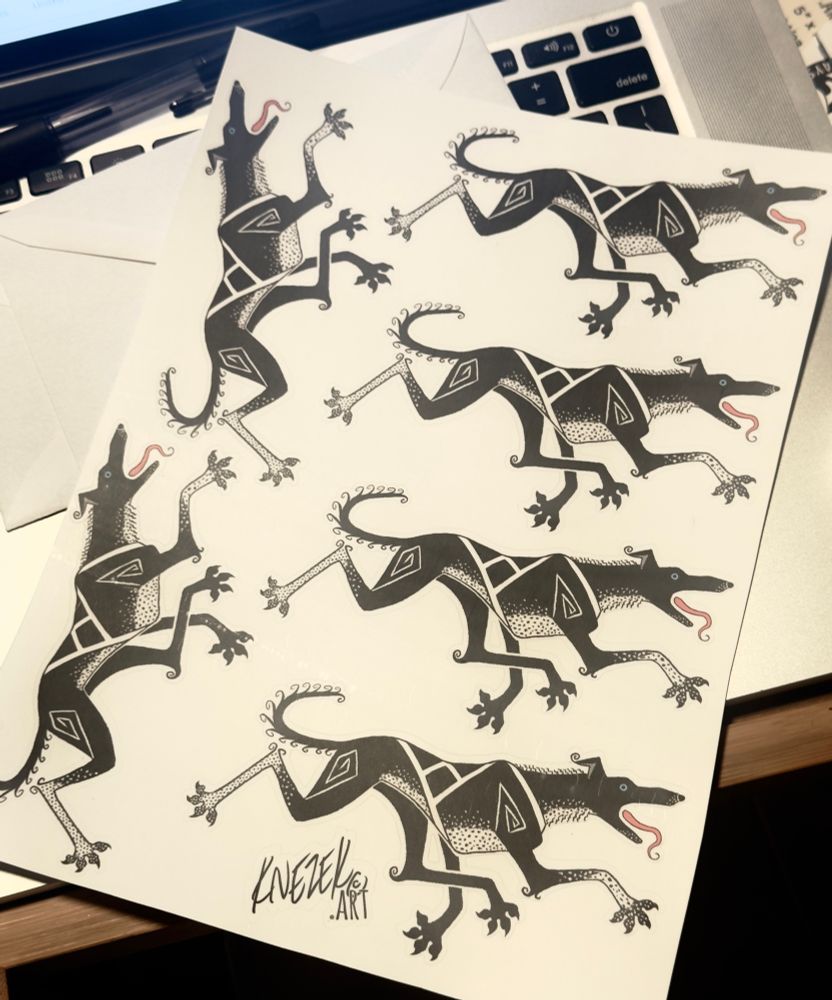 A large sticker sheet with six of the same awkward gangly black sled dog carefully Tetrised together so they all fit on one page together. 