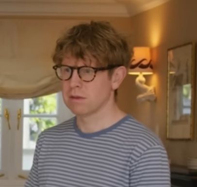 The comedic television presenter and holiday mansion landlord, Josh Widdicombe, looking sad while standing in a room that someone, somewhere, may feel is tastefully decorated.