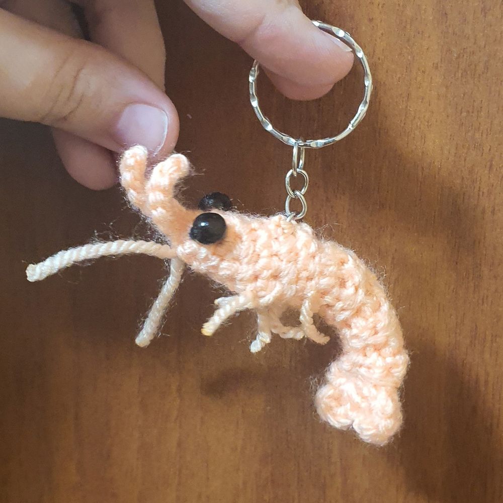 photo of a crocheted beige shrimp keychain