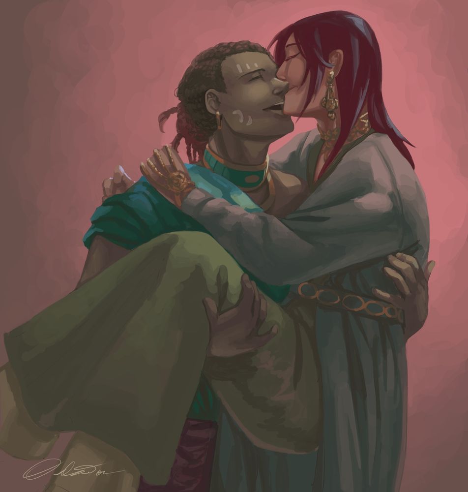 A man holding a GNB partner bridal style. He laughs while they kiss his cheek.
