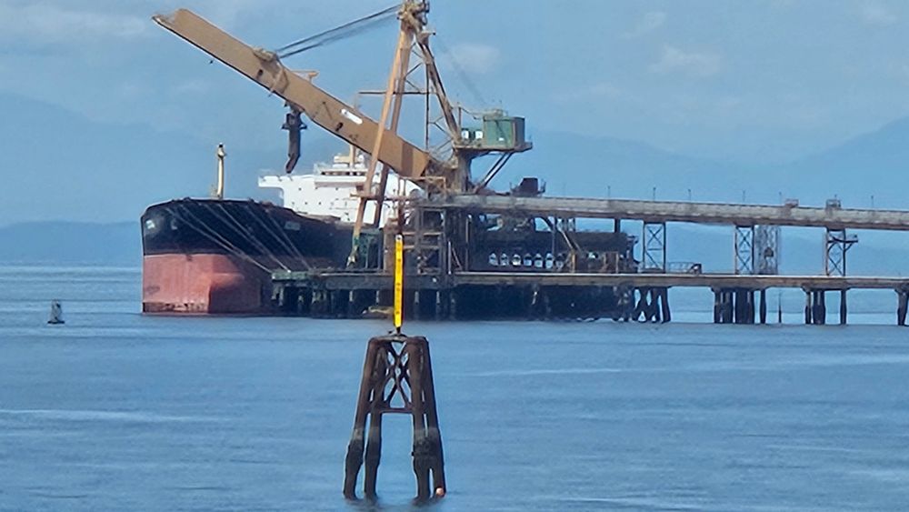 A big ship of some kind. It looks like it hauls coal 