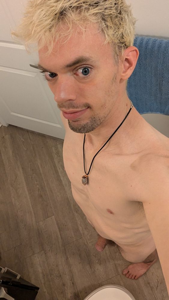 Downshot angle of me naked wearing my Shiva stone.