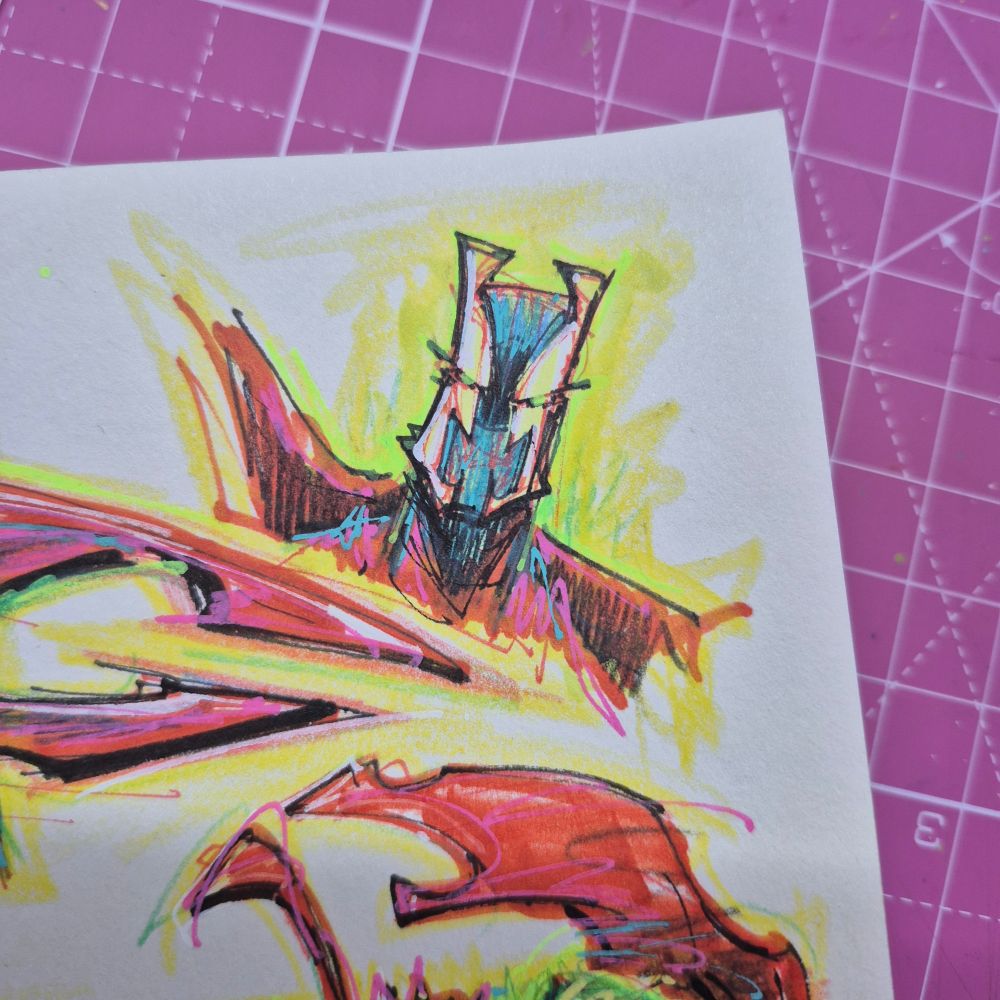 Close‑up of Rat City Spawn’s helmeted head, all sharp angles and glowing white eyes, framed by a flaring red cape and neon yellow light. Looks ready to raise hell and keep the city Spawn‑ning all night.

