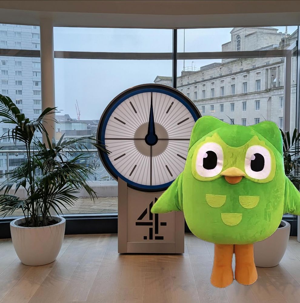 The countdown clock reads midday, and a big Channel 4 logo sits underneath. To the right the Duolingo owl stands. We can hear our lawyers screaming already.