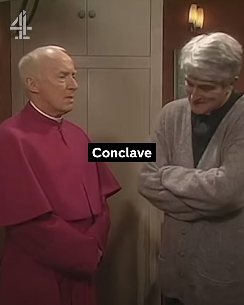 A shot from Father Ted with Ted and Bishop Brennan, they both look awkward, the text 'Conclave' sits across the frame.