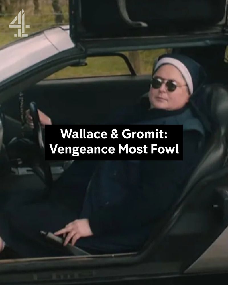 Sister Michael from Derry Girls sits in her Delorean, wearing sunglasses and the words 'Wallace And Gromit Vengence Most Fowl' sit mid screen.