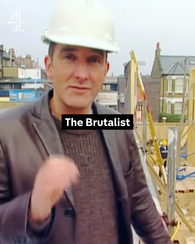 Kevin McCloud from Grand Designs stands on a building sit wearing a hard hat. The word 'The Brutalist' sits mid frame.