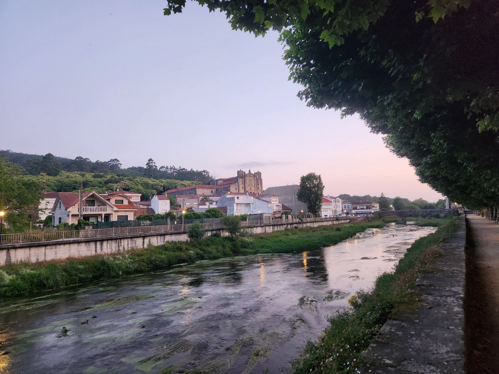 A river running through the center of Padron Spain in the early morning