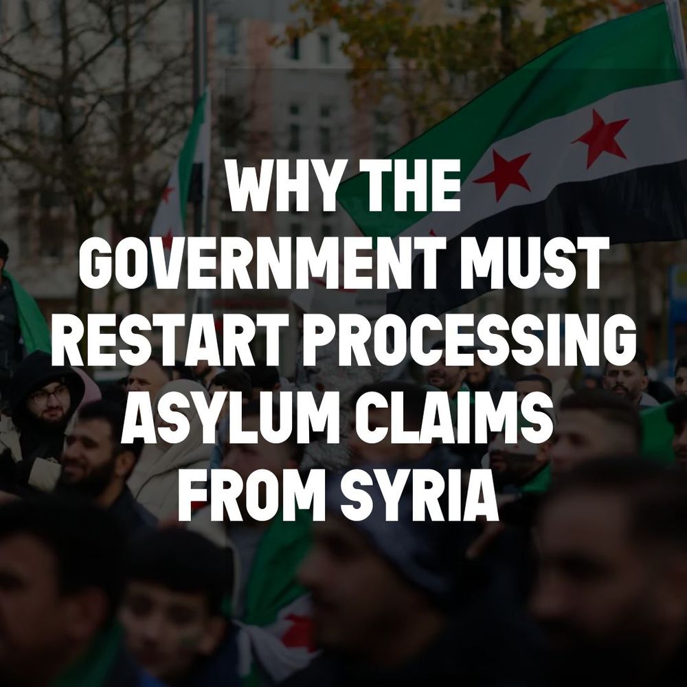Text overlaid on an image of people marching with the Syrian flag says: Why the government must restart processing asylum claims from Syria