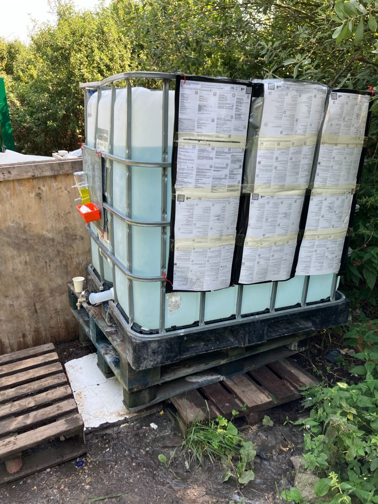 A water tank at an informal living site for people on the move in Calais, provided by volunteers from the Calais Food Collective - the French state refuses to provide any support at such sites as part of its “zero points of attachment” policy. 