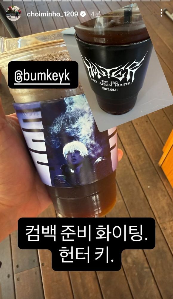 Minho insta story of iced coffee with a sleeve promoting key's new album and caption comeback preparation fighting. Hunter key.