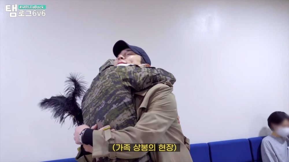 Minkey post enlistment hug