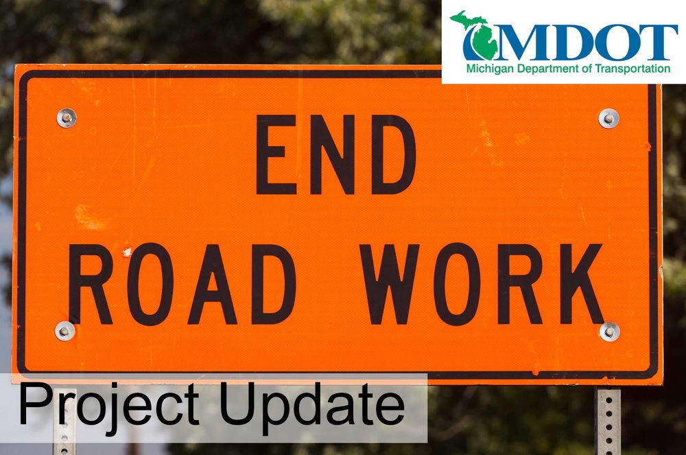 Orange sign reading End Road Work.