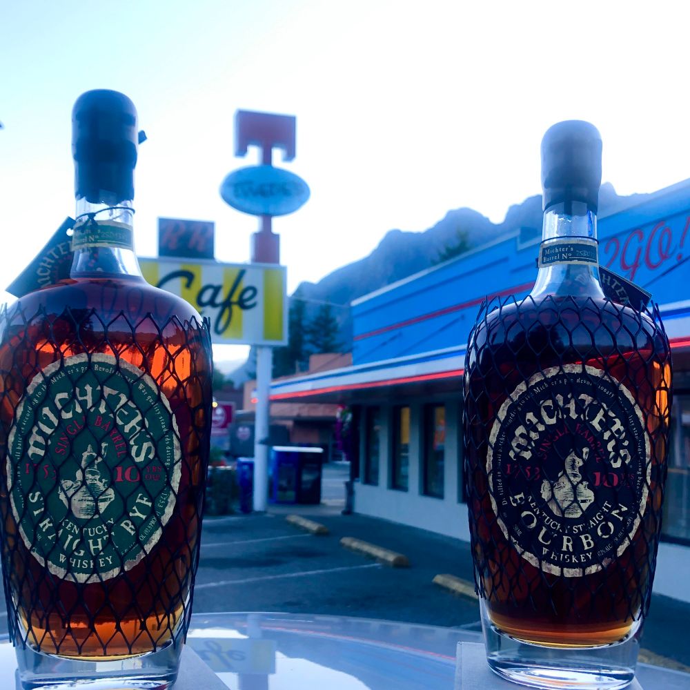 Michter’s 10-year bourbon and rye 2025 edition in front of Twede’s Cafe WA