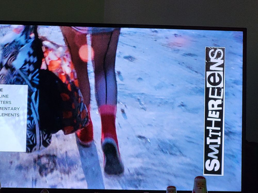 The legs of a girl,  walking away. 