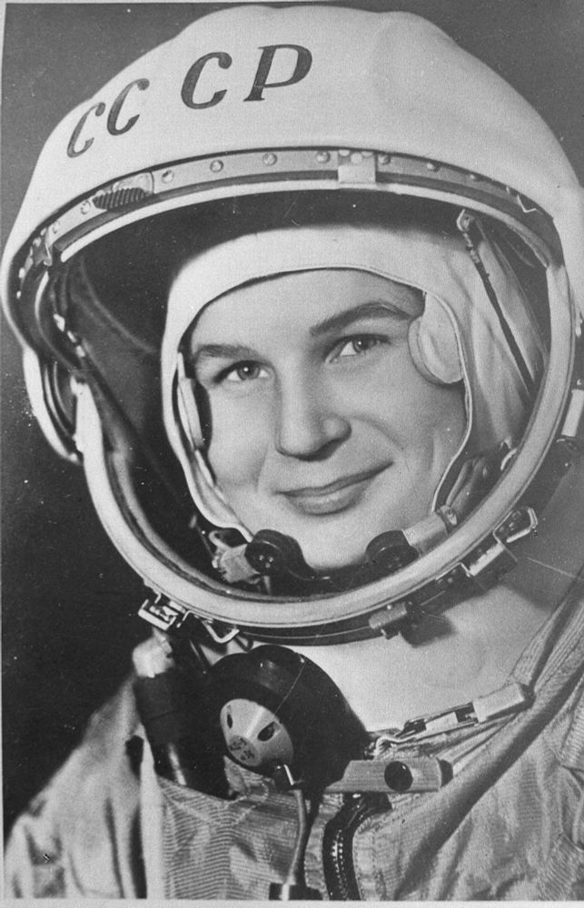 Valentina Tereshkova in Cosmonaut Suit – A Pioneering Moment in Space History

This iconic black-and-white photograph captures Valentina Tereshkova, the Soviet cosmonaut who became the first woman in space, smiling proudly in her flight suit and helmet marked “СССР” (USSR). Taken in 1963, the image commemorates the launch of Vostok 6 on June 16 of that year, a mission that lasted nearly three days and marked a pivotal moment in both space exploration and the global perception of women’s capabilities. Tereshkova, a former textile factory worker and amateur parachutist, was selected from more than 400 applicants to make this historic flight, not merely as a symbolic gesture but as a rigorous scientific endeavor. Her mission placed the USSR ahead of the United States in the space race once again—this time in gender inclusion.

The simplicity and clarity of the photograph contrast with the technical complexity of her achievement. The helmet, lined with communication equipment and sealed for spaceflight, reflects the utilitarian design of early Soviet space gear. Her composed expression belies the intensity of the training she underwent, including weightlessness simulations and isolation tests. Tereshkova manually operated the spacecraft, recorded physiological data, and kept detailed mission logs—essential contributions to the study of human endurance in space.

More than just a Soviet hero, Tereshkova became an international icon of gender equality and scientific advancement. Her flight shattered assumptions about the limitations of women in extreme environments and opened doors for future generations of female astronauts. Her legacy endures today not only in Russia, where she was named a Hero of the Soviet Union, but also globally, as a trailblazer whose journey redefined the boundaries of who could represent humanity in the cosmos.