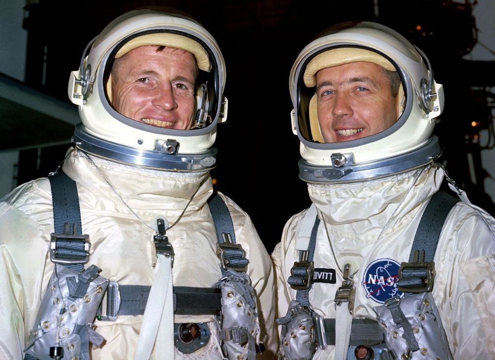 Gemini IV Astronauts Ed White and James McDivitt Prepare for Launch

This historic image captures NASA astronauts Ed White (left) and James McDivitt (right) fully suited in their pressure gear just before launch during the Gemini IV mission in June 1965. Smiling confidently, the two men represent the cutting edge of 1960s spaceflight during one of NASA’s most ambitious early efforts. As the command pilot, McDivitt oversaw spacecraft operations while Ed White served as the pilot and was selected for the mission’s most daring experiment—America’s first spacewalk. Their flight was only the second crewed mission in NASA’s Gemini program, which served as the crucial link between the short-duration Mercury missions and the long-term complexities of the Apollo lunar program. The image is a testament to the intense training and trust that existed between crew members. Gemini IV’s four-day journey marked a major step toward prolonged space operations, testing spacecraft endurance, human adaptability, and maneuvering capabilities. White and McDivitt trained extensively for the mission, including underwater simulations and high-altitude flights, helping engineers refine protocols for extravehicular activity (EVA), orbital rendezvous, and long-term life support in zero gravity. Their matching pressure suits—white with reinforced joints and fitted helmets—reflected improvements in mobility and protection. Though McDivitt remained inside the capsule, his steady piloting during White’s EVA was critical to mission success. Their teamwork laid the groundwork for future pair-based astronaut operations seen during Apollo lunar missions. This photograph, taken at a time when spaceflight was still new and deeply experimental, is a portrait of trust, discipline, and pioneering spirit. It reminds us that every iconic space milestone relies not only on engineering breakthroughs but also on the human bonds that make such feats possible.