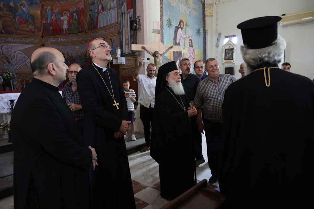 Cardinal Pizzaballa and Patriarch Theophilos III inside the Holy Family Church in Gaza