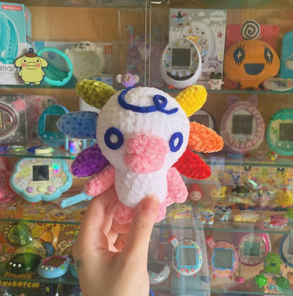 The Tamagotchi character Woopatchi, crocheted in super soft chenille yarn!