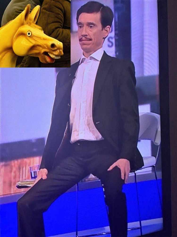Rory Stewart, sitting legs akimbo, with a bad photoshop of the carousel horse from We Live In Time that went viral.