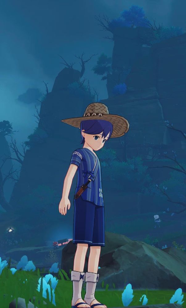Un niño vestido de azul con el pelo azul y un sombrero de paja