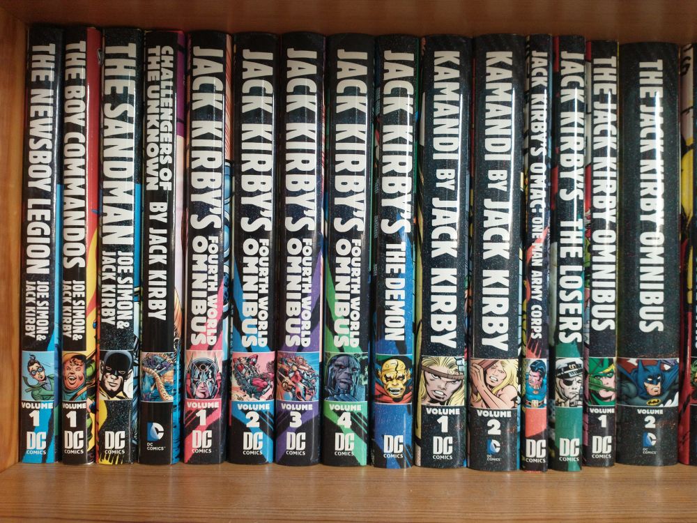 A shelf of Jack Kirby Omnibus editions published by DC Comics 