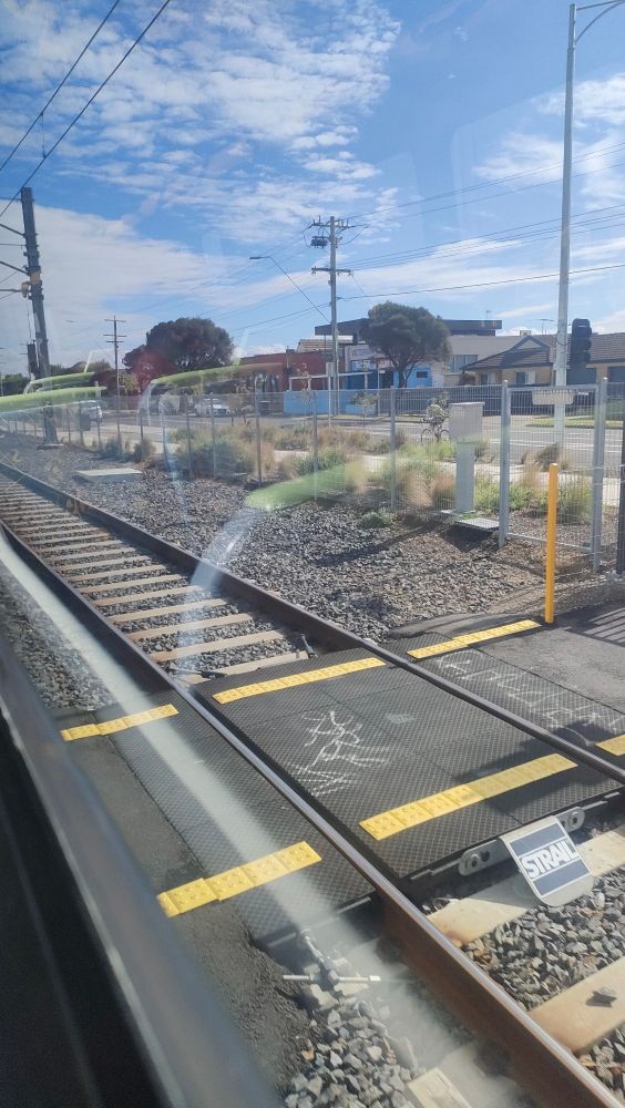 Video taken from window of train traveling toward Melbourne CBD.