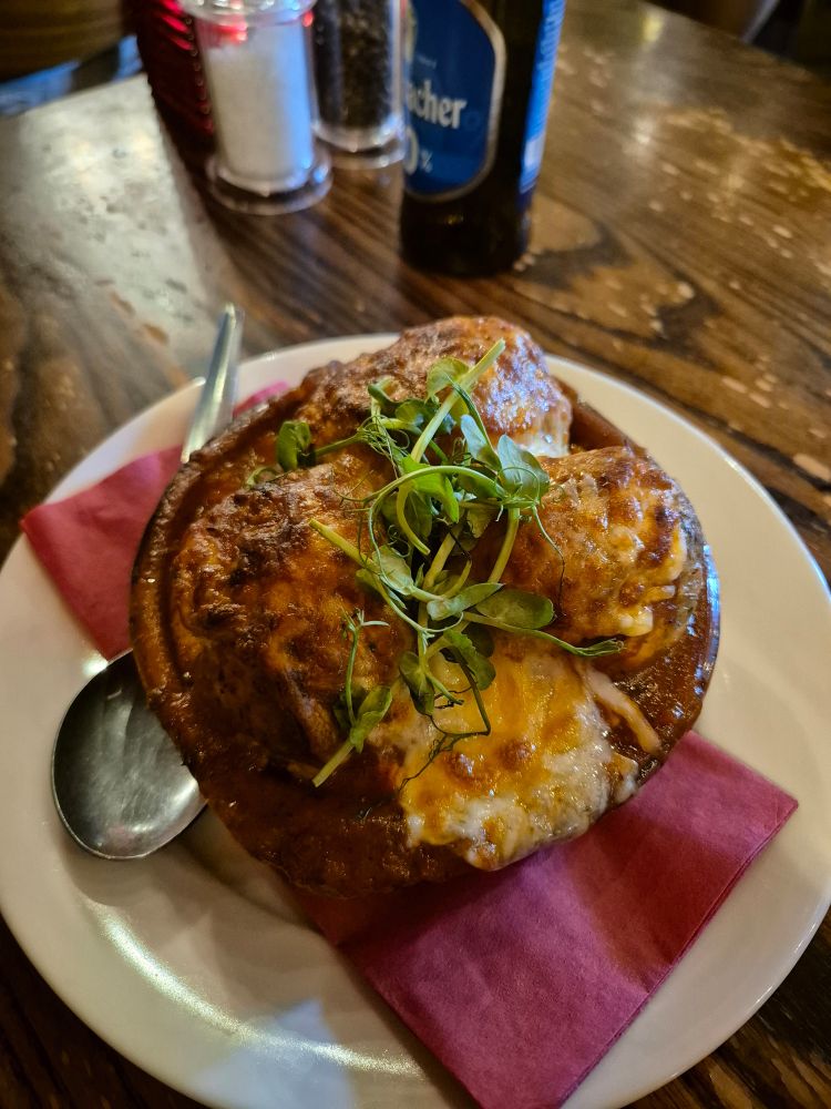 Meatballs in tomato sauce with cheese. They are massive