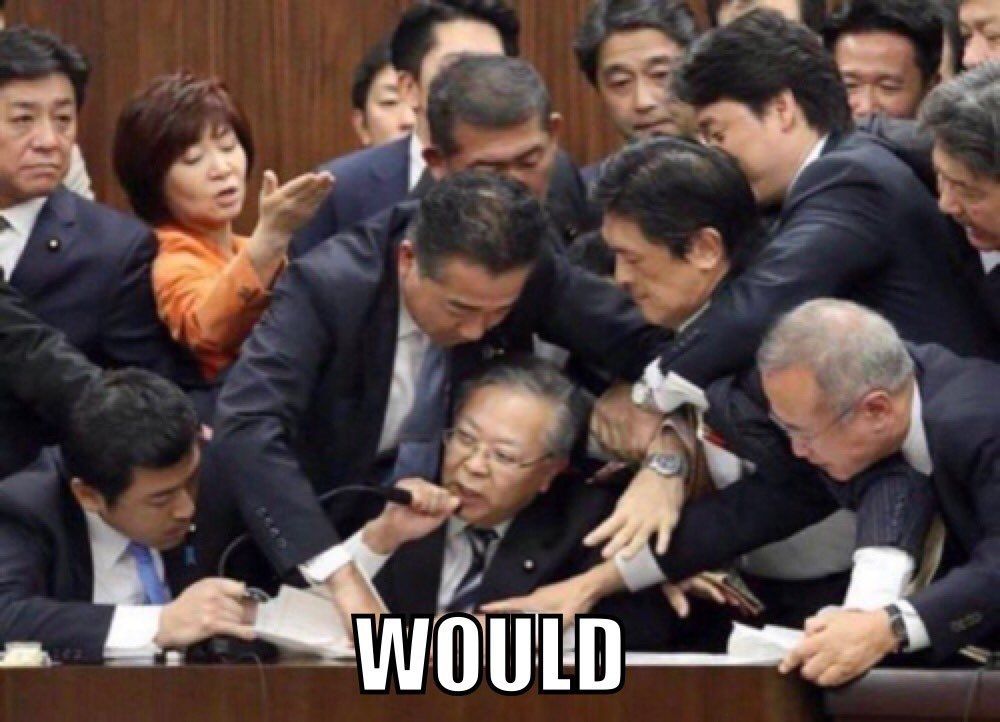 Member of parliament taking control of mic to say 