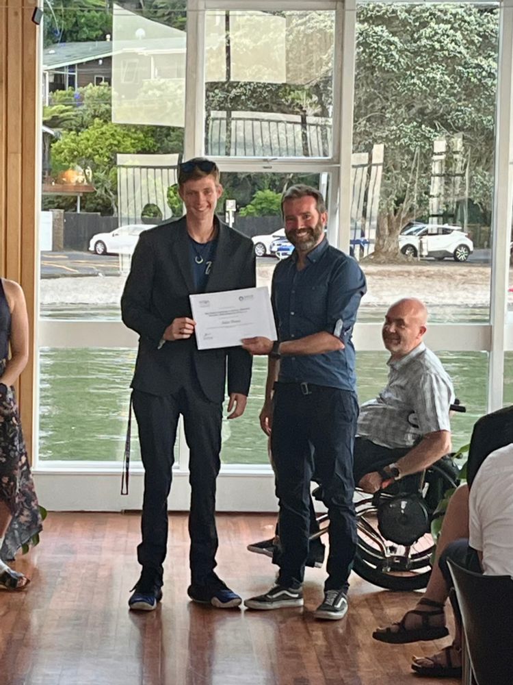 Receiving certificate of achievement 