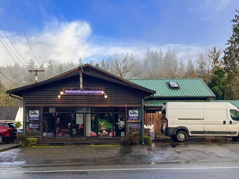 Former site of Twin Peaks’ Big Ed’s Gas Farm photographed on February 24, 2025. The building now has dark wood paneled walls and is occupied by Balloon Designers.