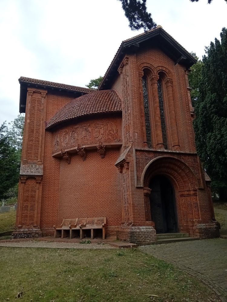 Tall ornate red bricked chapel